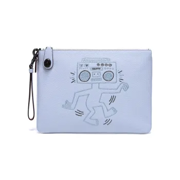 Keith Haring X COACH Turnlock Clutches
