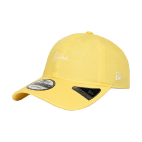 Blue bucket hat with a red logo embroidery from
