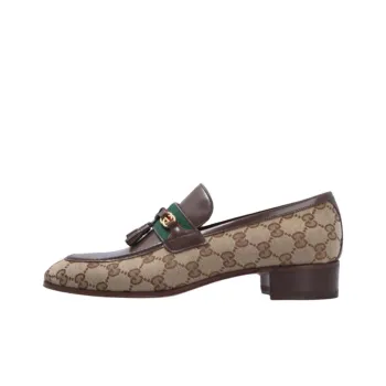 GUCCI Tassel detail GG Canvas Loafers