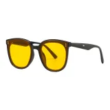 Black Frame with Yellow Lens