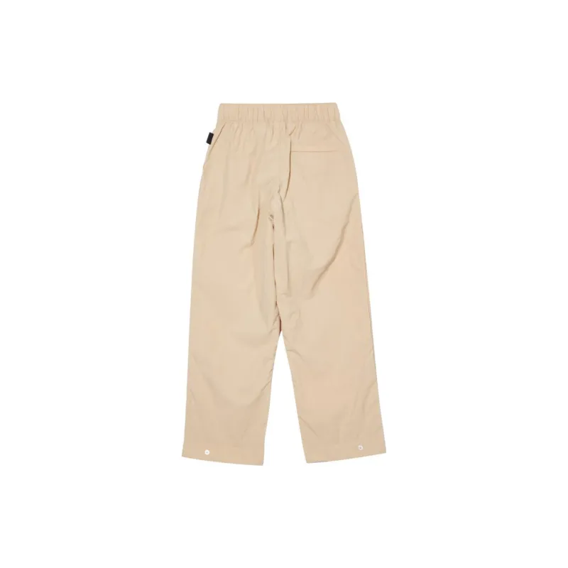 PUMA MMQ Knitted Sports Pants Unisex Earth Yellow-1