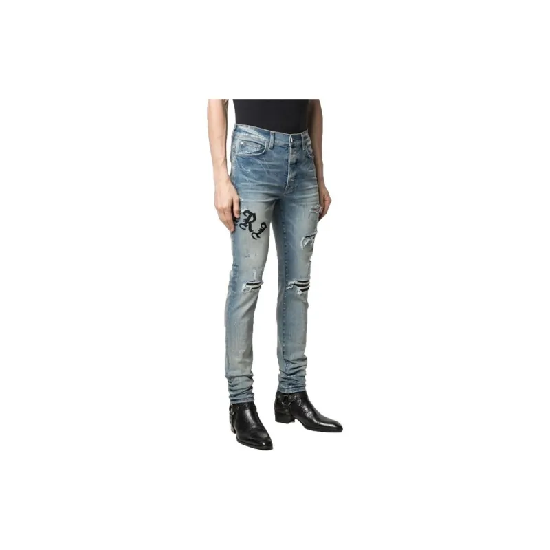 AMIRI Music Note Distressed Skinny Jeans-1