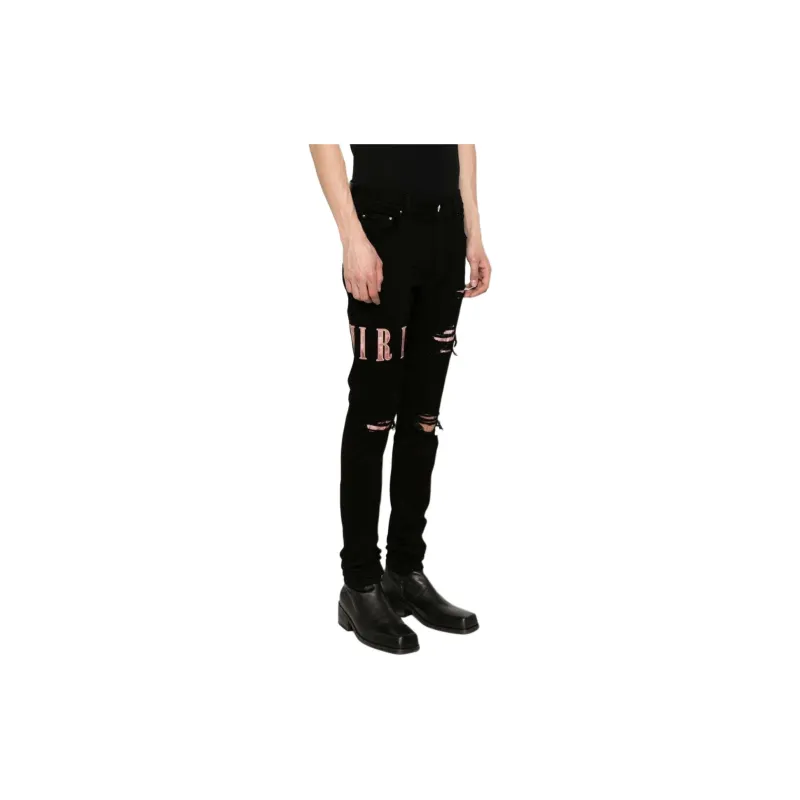 AMIRI Waxed Logo appliqué Skinny Jeans-3