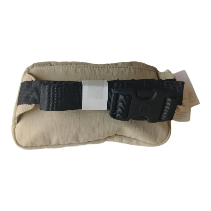 Lululemon Everywhere Nylon Crossbody Bag, Shoulder Bag Mini Unisex Beige-1