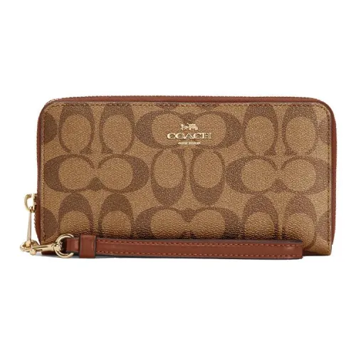 COACH Zip Around Clutches