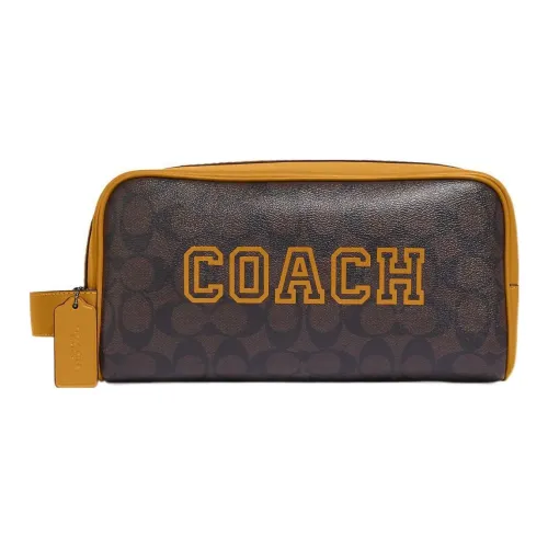 COACH Travel Kit Clutches