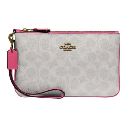 COACH Wristlet Clutches