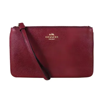 COACH Wristlet Clutches