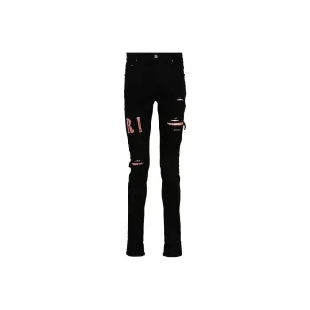 AMIRI Logo Patch Distressed Skinny Jeans