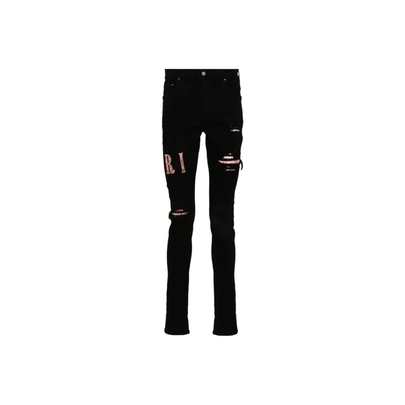 AMIRI Waxed Logo appliqué Skinny Jeans-0