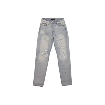 AMIRI Destroyed Slouch Skinny Jeans