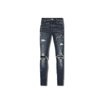 AMIRI Logo Distressed Skinny Jeans