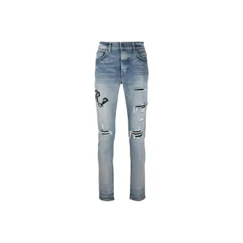 AMIRI Music Note Distressed Skinny Jeans