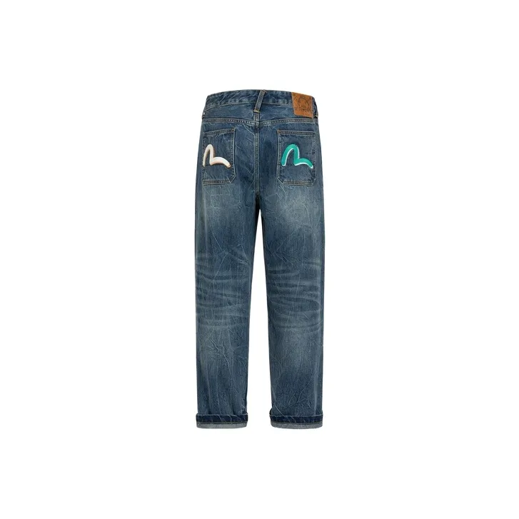 EVISU Slogan-print Tapered-leg Jeans-0