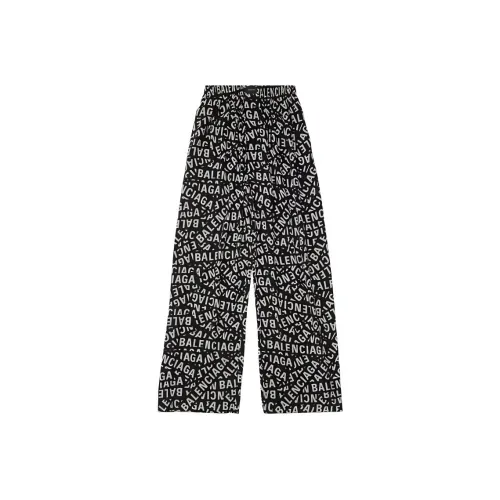 Balenciaga All Over Logo Printed Wide Leg Trousers