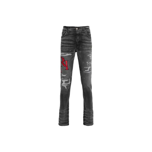 AMIRI Staggered Logo Distressed Skinny Jeans