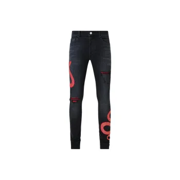 AMIRI Snake Printed Distressed Jeans