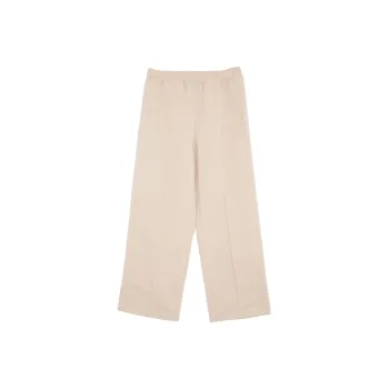 PUMA APRES COURT WOVEN PANTS Casual Pants Unisex Pine Sand