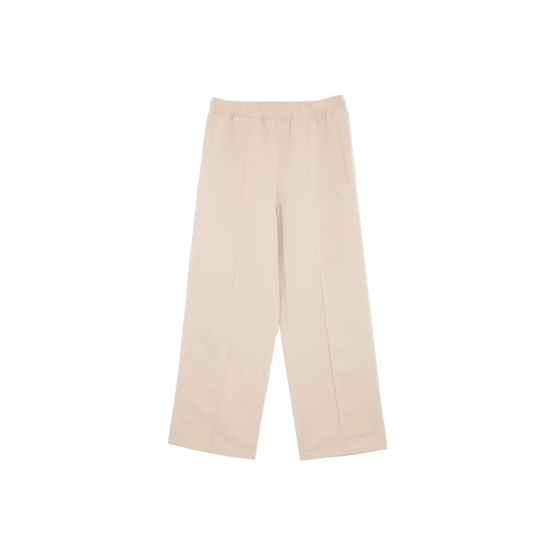 PUMA APRES COURT WOVEN PANTS Casual Pants Unisex Pine Sand-0