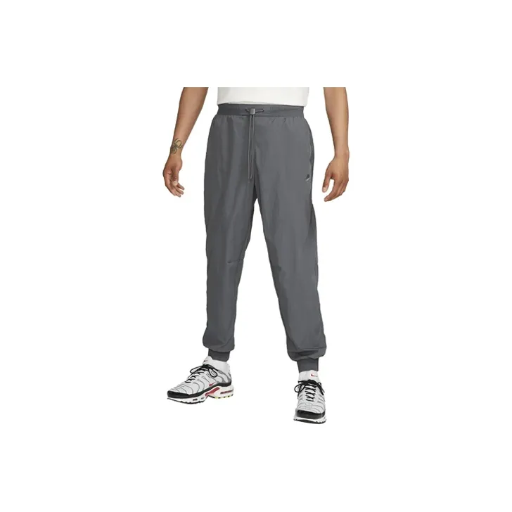 Nike SPORTSWEAR TECH PACK Sports Pants Men Gray-0