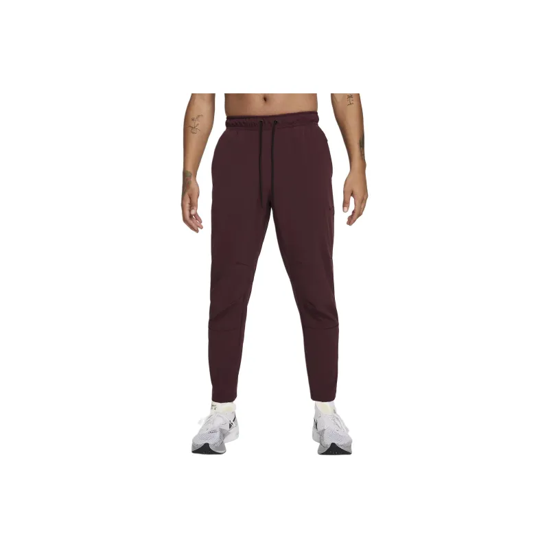 Nike Unlimited Men's Dri FIT Tapered Leg Versatile Pants-0