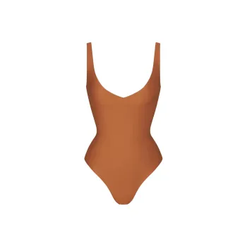 SKIMS BODY UNLINED PLUNGE THONG BODYSUIT Bodysuits Women's Bronze/Bronze