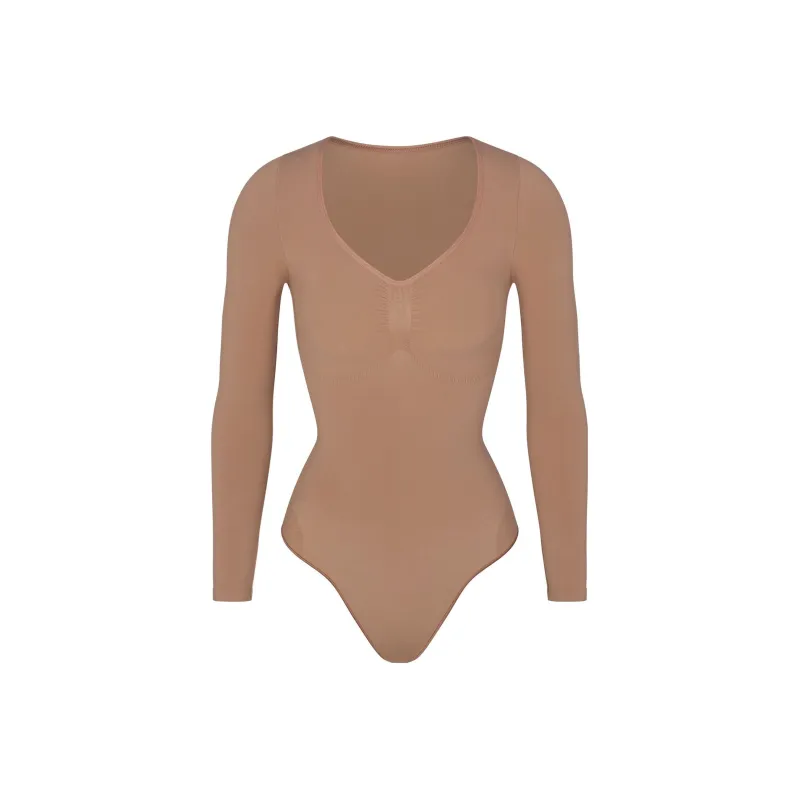 Skims SEAMLESS SCULPT LONG SLEEVE THONG BODYSUIT Bodysuits Women's SIENNA/Ochre-0