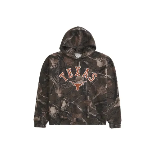Add a well-crafted leather jacket white button-up understated black pants Camouflage