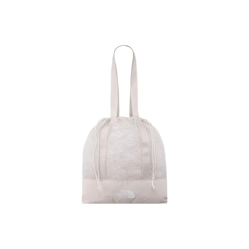 Here she is on a different occasion carrying a rusty red Mansur Gavriel Shoulder Bag