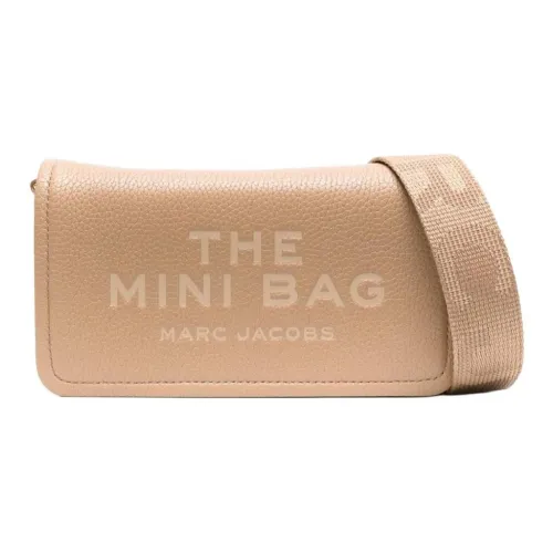 I would take the Tory Burch or the Marc Jacobs