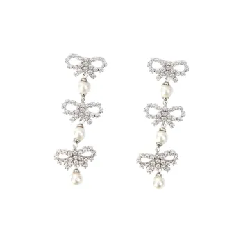 Self portrait Brass Earrings Women's Silver