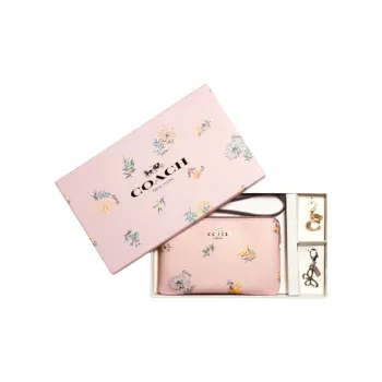 COACH Corner Zip Clutches