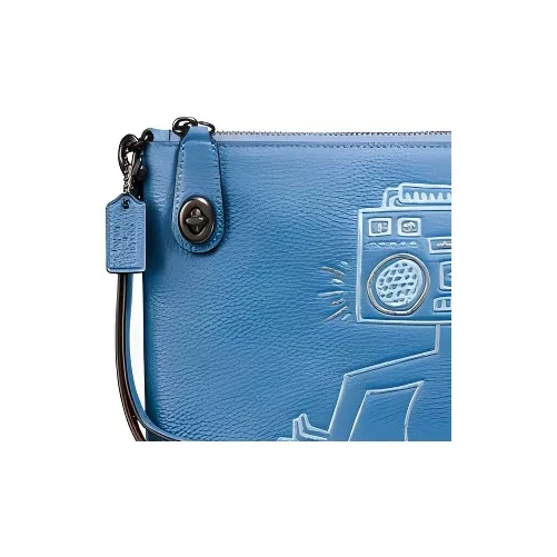 Keith Haring X COACH Turnlock Clutches-1
