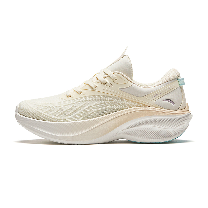 white and gold running shoes