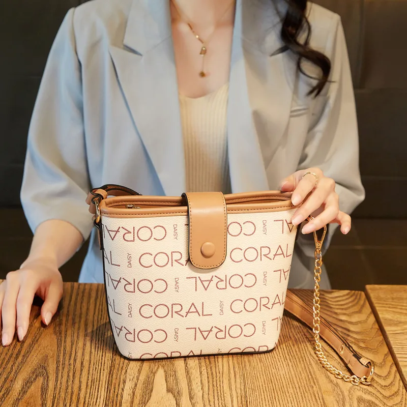 CORALDAISY Synthetic Leather Shoulder Bag Crossbody Bag Women's Ecru/Coffee-1