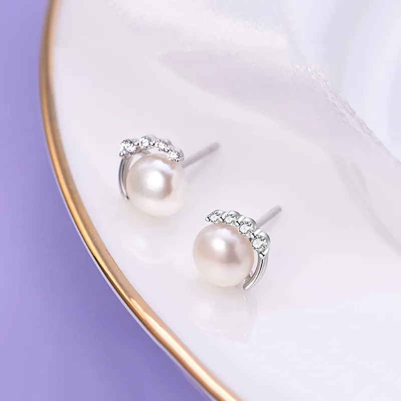 ZHOUBAIFU Pearl Stud Earrings Unisex-1