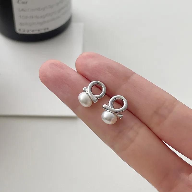 ZHOUBAIFU Pearl Stud Earrings Unisex-1