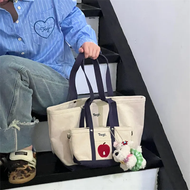 Tagi. Imagine Apple Fabric Shoulder Bag, Crossbody Bag, Handbag Trumpets Unisex Cream-1