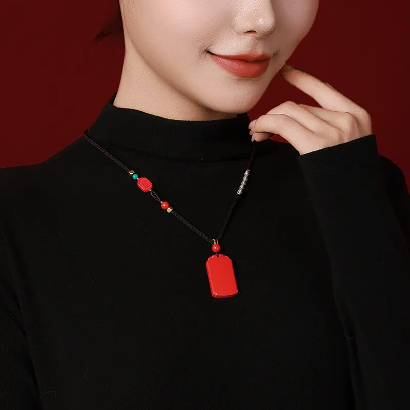 With The Heart Of The Jade Reconstructed Cinnabar Necklaces Unisex-1