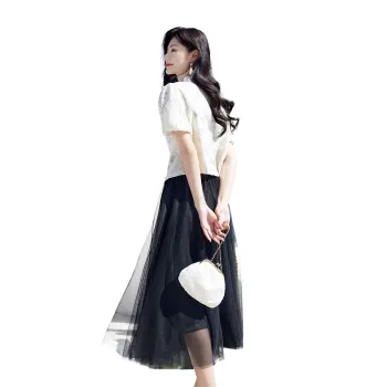 A Paradise For Awakening Skirt Set Women's Beige Top And Black Bottom