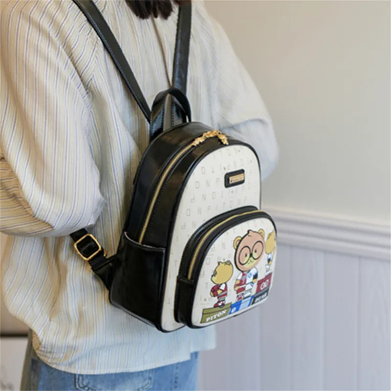 North Pack PU Backpack Regular Women's Black/Ginger Yellow/Green-1