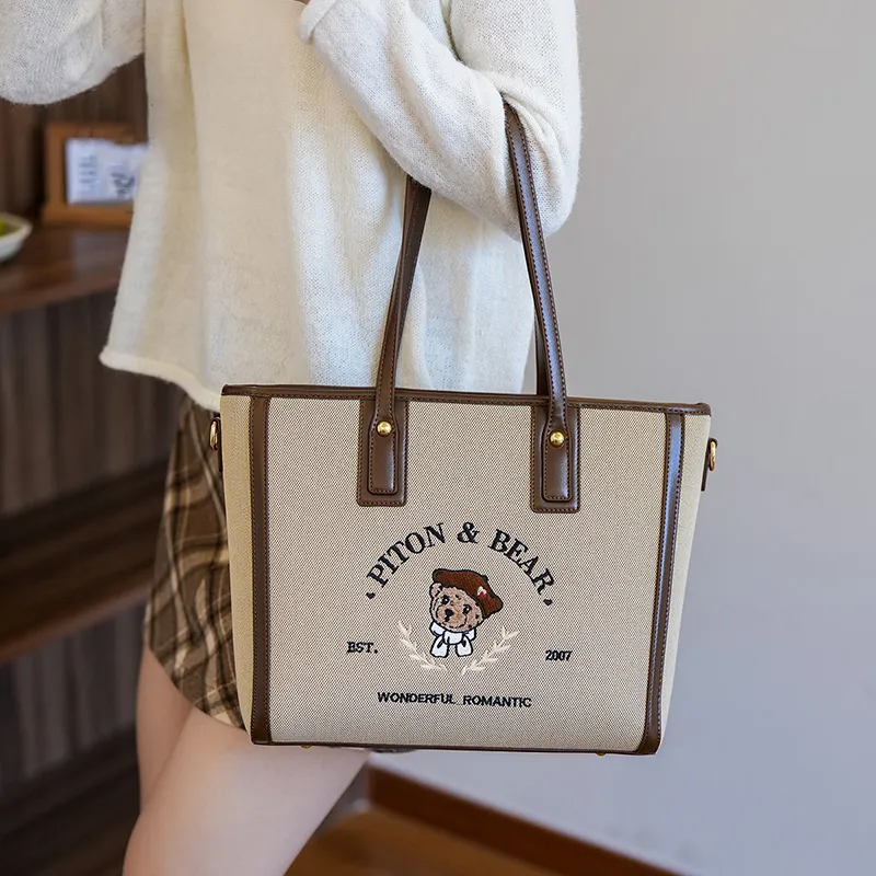 North Pack PU Stitched Canvas Shoulder Bag Women's Ecru/Khaki-1