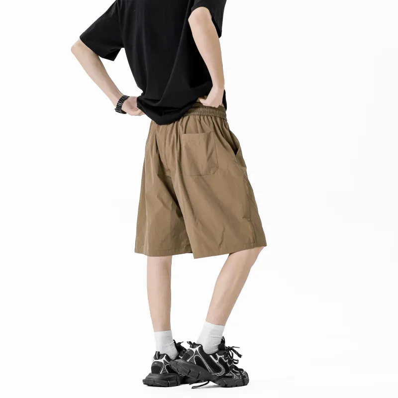TUCANO Sports Shorts Unisex-9