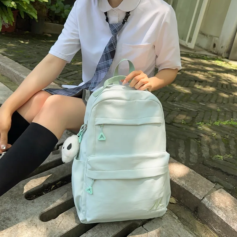 NX DOUGHNUT Oxford Backpack Unisex Ecru/Black/Violet/Light Blue-11