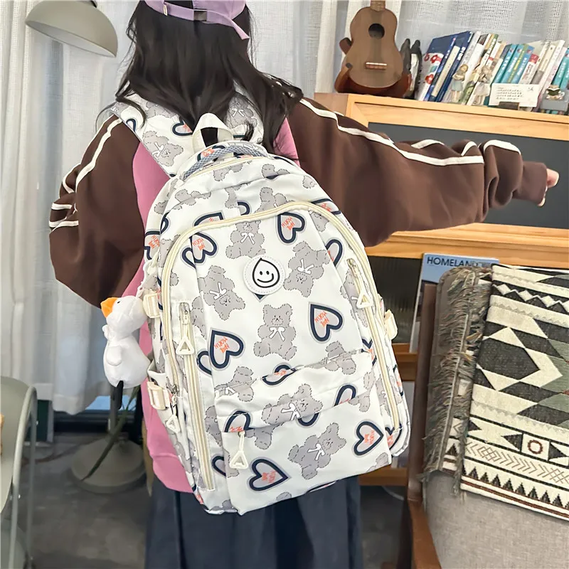 NX DOUGHNUT Composite Cloth Backpack Unisex Multicolor-1