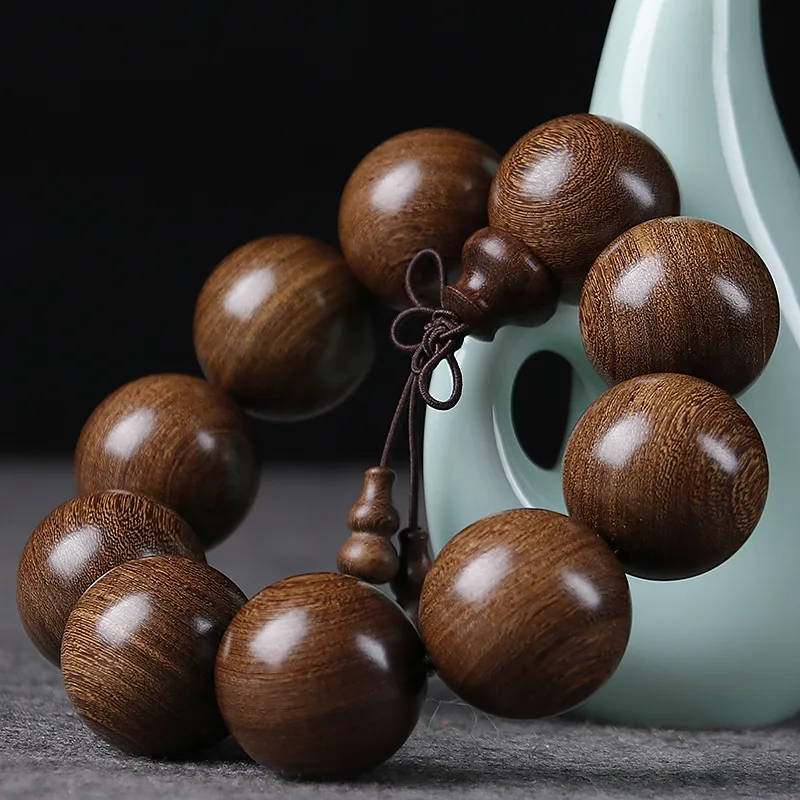 Is Here Golden Sandalwood Bracelets Unisex-1
