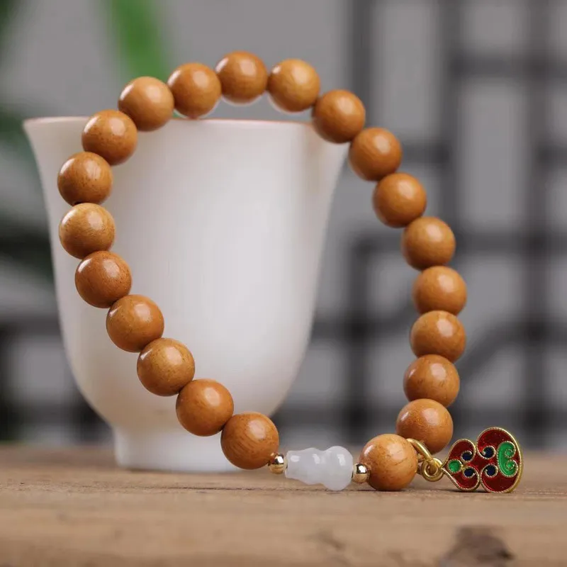 Is Here Barbie Sandalwood Bracelets Unisex-4
