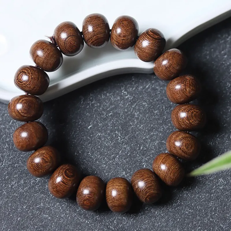 Is Here Golden Sandalwood Bracelets Unisex-1