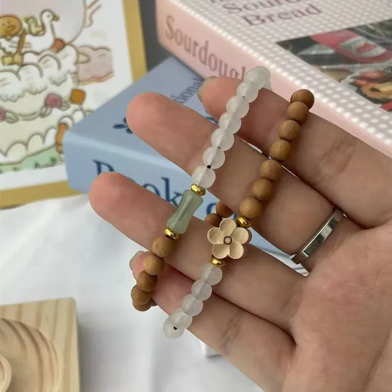 Is Here Barbie Sandalwood Bracelets Unisex-2