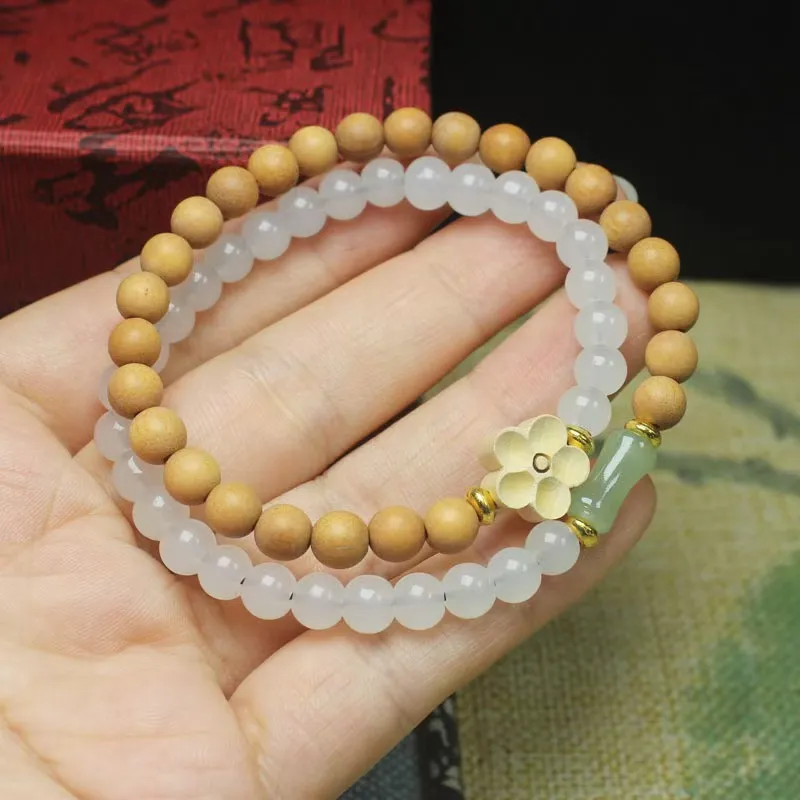 Is Here Barbie Sandalwood Bracelets Unisex-1